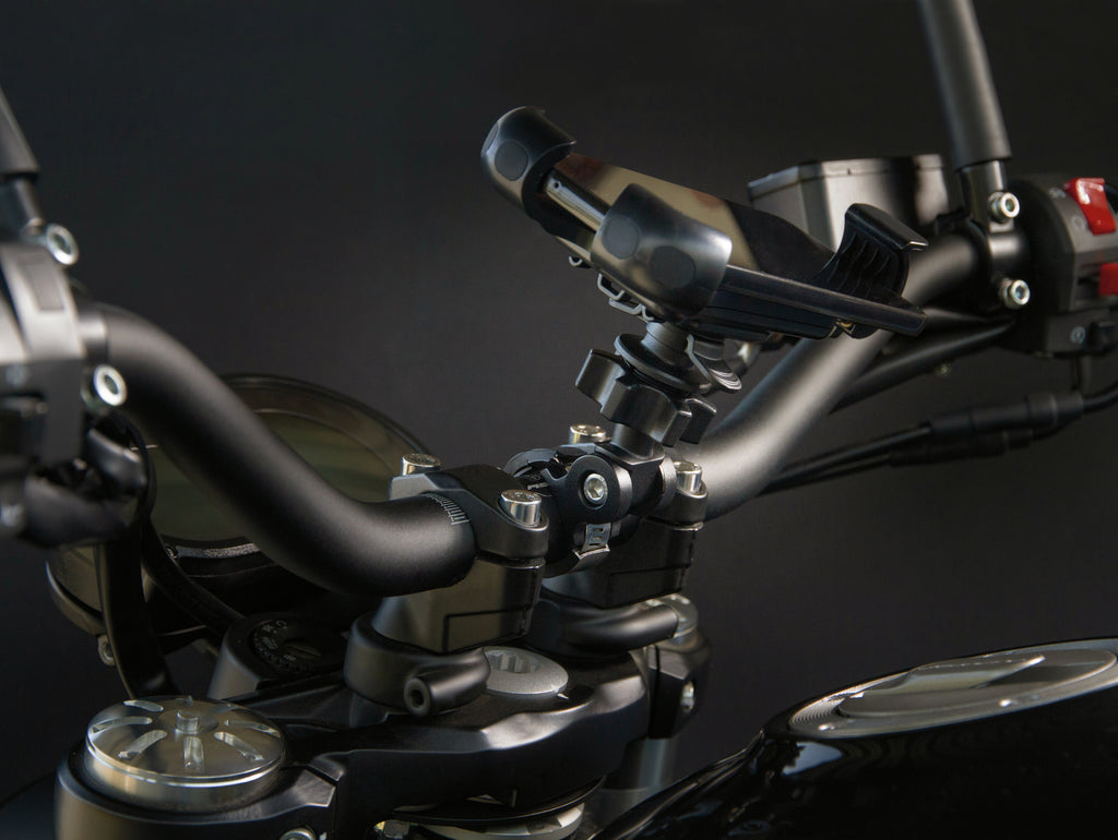Titan Clamp, attacco multifunzione regolabile per manubrio